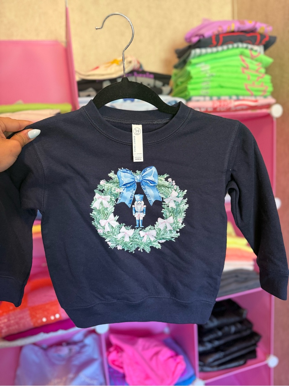 Rabbit Skins Navy Nutcracker Wreath Sweatshirt with Blue Bow